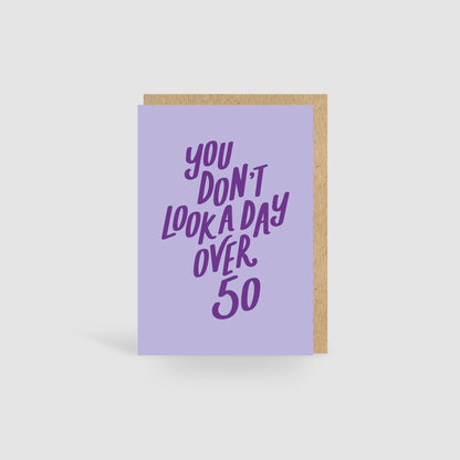 You Don't Look A Day Over 50! Yellow Birthday Card